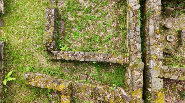 Aerial revealing shot of Castro de Armea ruins in Spain