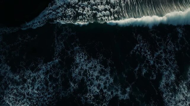 ocean waves forming abstract flowing patterns