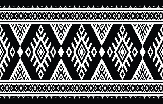 Abstract Ethnic Geometric Oriental Pattern &mdash; Black Dominant White Aztec Chevron Seamless Textile Design Dark Background
