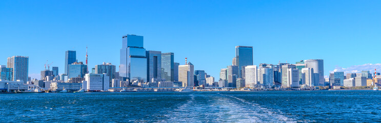 Naklejka premium Tokyo waterfront skyline viewed from a boat in Japan