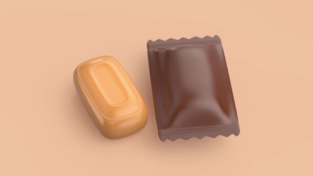 Caramel hard candies on a light orange background