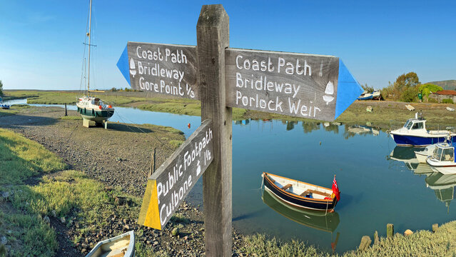  Signpost for the South West coast path at Porlock weir , Somerset, Uk