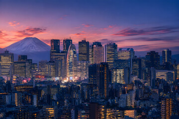 Fototapeta premium Tokyo Skyline at Sunset with Illuminated Skyscrapers and Mount Fuji