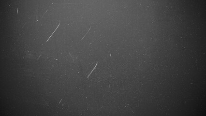 grunge overlay effect with scratch and dust on black background,retro noisy grain dust texture for film overlay effect on black background,old photo overlay texture,black and white grunge texture © Cool-Hunter