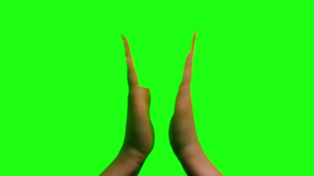 Hands clapping against a green screen background. Celebration, applause, and cheering gesture on chroma key. High quality 4k footage