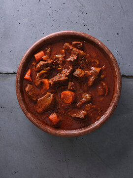 Slow cooked shredded beef dish served in a bowl with carrots, ready to enjoy for lunch or dinner with family or friends