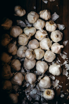 Garlic cloves on a wooden background