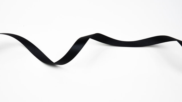 Abstract shape black ribbon isolated on white background.
top view.