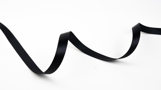 Abstract shape black ribbon isolated on white background.
top view.