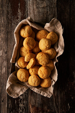 Butter Orange Cookies on Wood Background