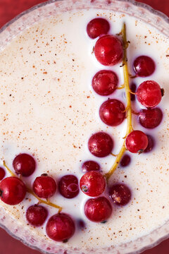 Redcurrants in white liquid