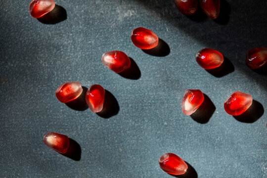 Pomegranate Arils on a Dark Background