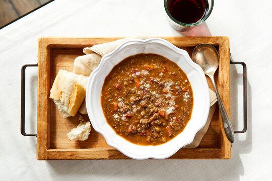 Cozy Lentil Soup with Bread and Red Wine