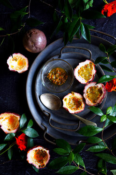 Australian Black Passionfruit (Passiflora Edulis) is a popular fruit known for its sweet, aromatic pulp and unique, vibrant flavour. The versatile pulp adds a tropical touch to various dishes