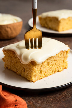 Fork inside piece of sheet cake