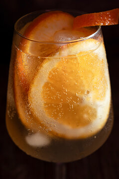 Closeup of glass with orange cocktail