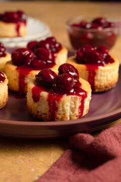 Baked mini cheesecakes with cherries