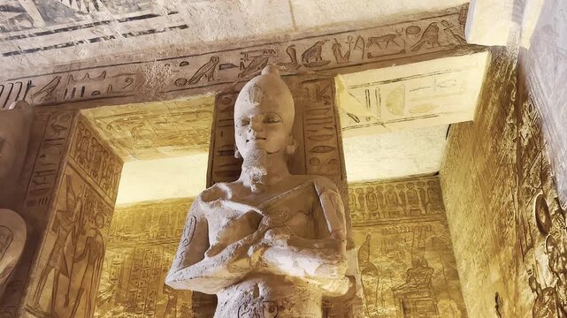 Interior decoration and statues in the Abu Simbel temple, a landmark in Nubia built by King Ramesses II, Egypt.