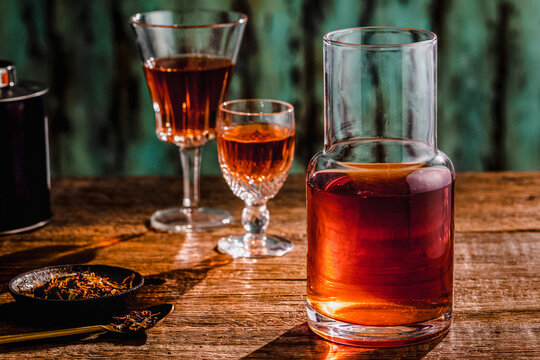 Tea served in a glass carafe with etched