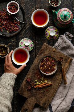 Spiced tea and botanicals arranged for a warm, cozy brew
