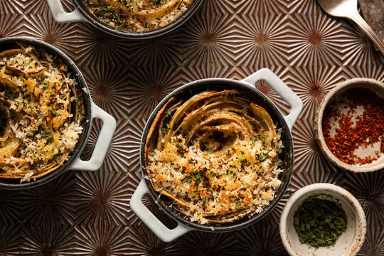 ndividual scalloped potatoes baked in small casserole dishes