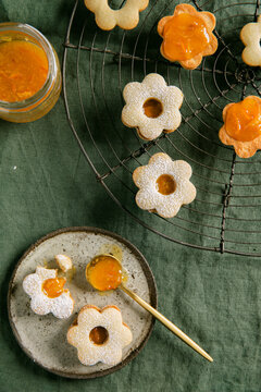 Flower-Shaped Jam Cookies on Cooling Rack