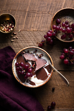 Yogurt Bowl With Chocolate And Grapes