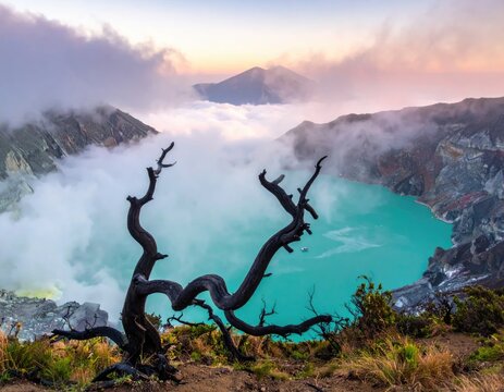 Majestic Volcanic Crater Lake at Sunrise with Dead Tree Silhouette.