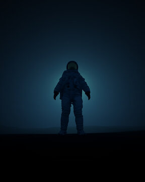 Dramatic Standing Astronaut Spacesuit Dark Background Sci Fi Mysterious Glowing Light Blue Tones Isolated Figure 3d illustration