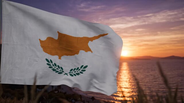 Flag of Cyprus waving by the sea at sunset