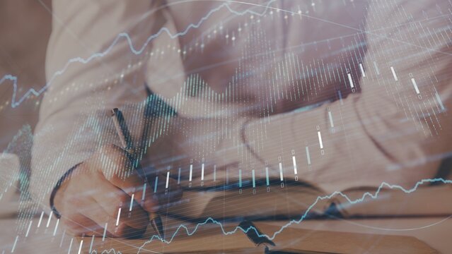 Trader Analyzing Market Trends and Document Signing with Double Exposure Forex Graph