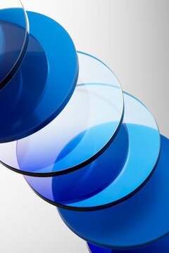 3D blue circular layers with transparent glass overlap