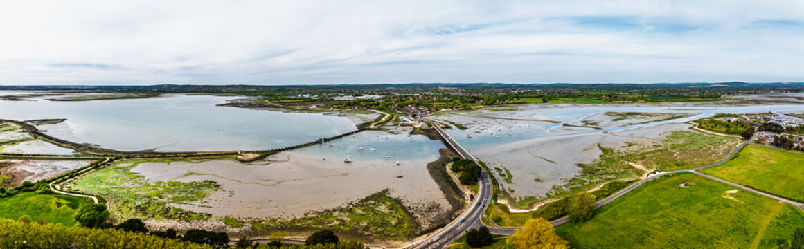 Bridge and Quay to the Hayling Island from a dron at low tide, Havant, Hampshire, England