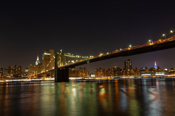 Fototapeta premium Brooklyn Bridge Illuminated at Night in New York