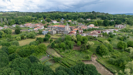Obraz premium Allariz village church and houses in rural Galicia