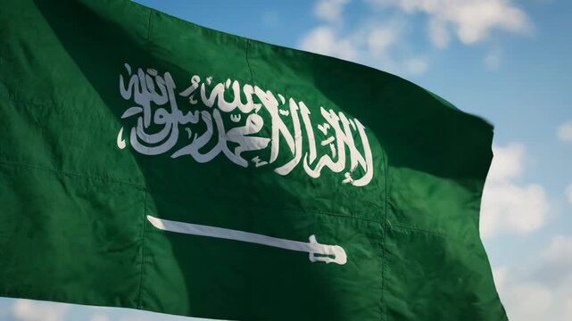 Saudi Arabia flag waving in sky