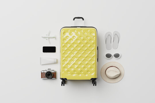 Travel accessories with suitcase on minimal white background