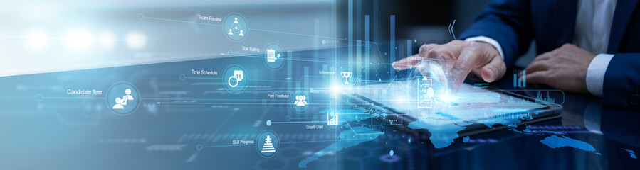 Quality auditor touches the tablet to perform an Assessment, reviewing performance metrics on a...