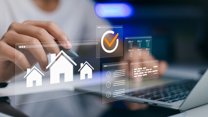 Businessman using Stylus to Search Real Estate Property for Investment on Virtual Screen