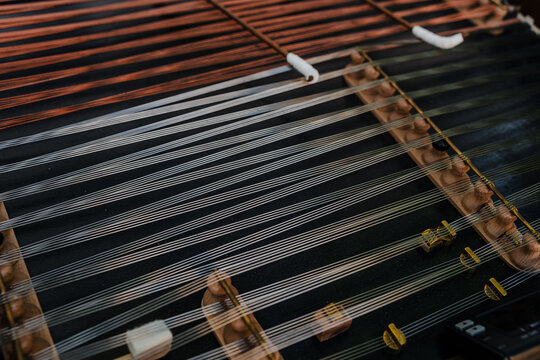 Cimbalom Strings Close Up, Traditional Musical Instrument Detail, Hammered Dulcimer Metal Wires Folk Music Texture Background