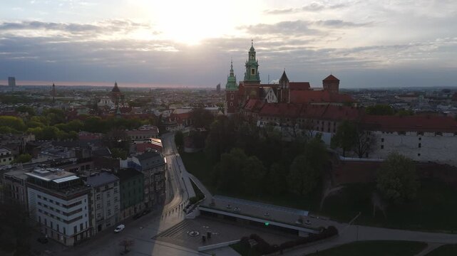 Aerial flyover of Wawel Castle at dawn in spring in Krakow