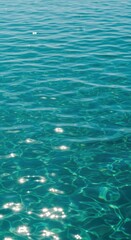 Fototapeta premium Vibrant surface texture of deep teal fresh water reflecting sunlight, suggesting purity and clarity in a natural setting, reflective, refreshment, nature