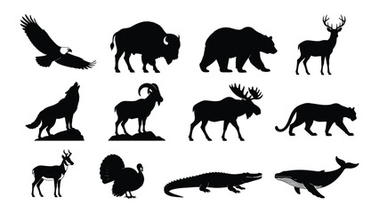 Naklejka premium Collection of black silhouettes of various wild animals on white background