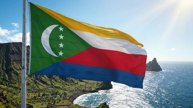 Comoros flag waving by the sea