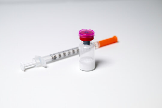 Peptides and syringe. Peptides are amino acids that are used in a myriad of medical ways from glucose control to battling inflammation.