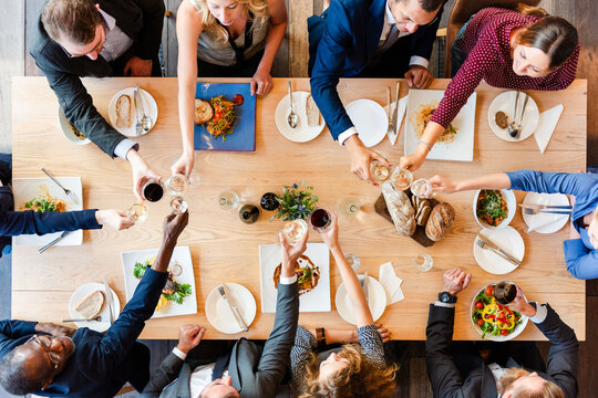 Diverse group dining together joyfully