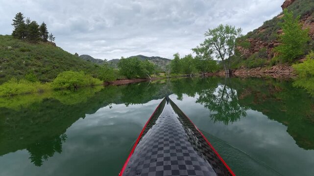 Immersive POV from a kayak - paddling on Horsetooth Reservoir in Fort Collins, Colorado, spring scenery 