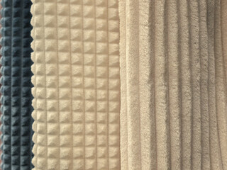 Cream and beige plush textured fleece blanket fabric with waffle square pattern © Vertstyle