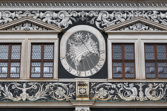 Cityscape - view of the exterior of the Long Corridor with sundial and sgraffito painting in the Eastern courtyard of Dresden Castle, Saxony, Germany