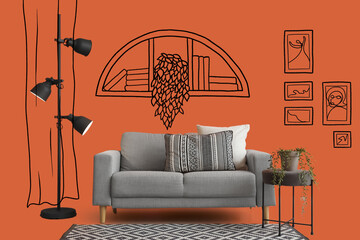 Interior of stylish living room with cozy grey sofa, coffee table and glowing standard lamp near...